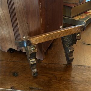 Rustic Brown Wooden Wall Shelf with Brass Nail Accents